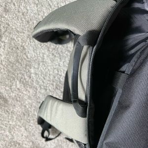 Olive green roll top backpack